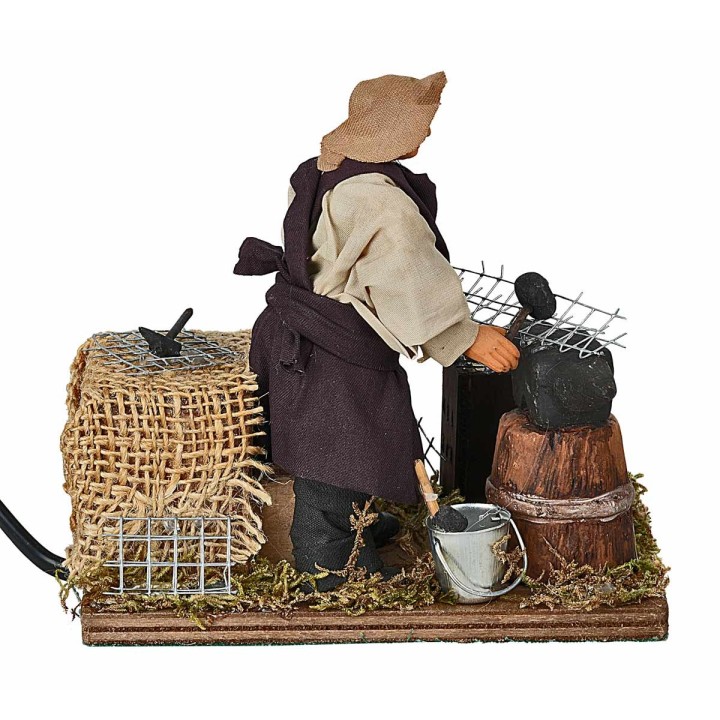 Blacksmith at work in motion 12 cm