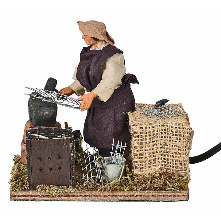 Blacksmith at work in motion 12 cm
