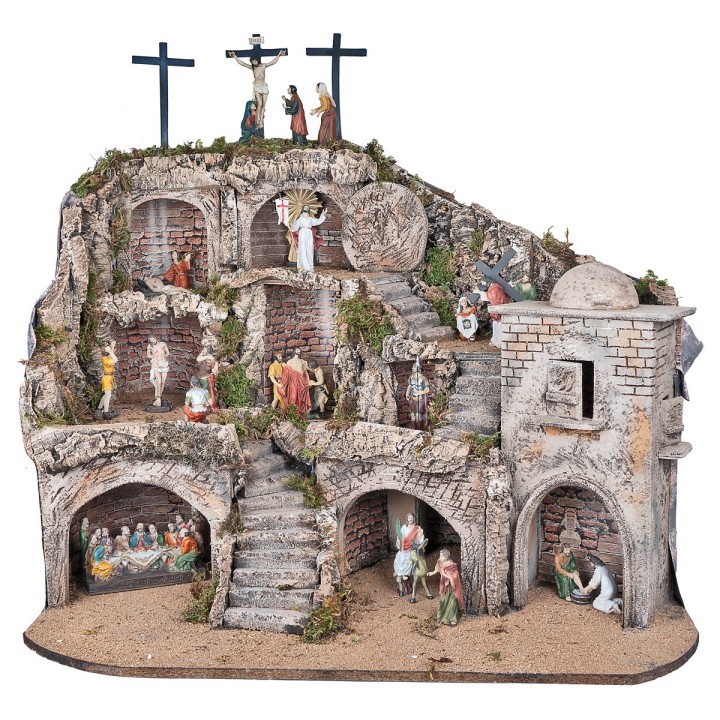 Illuminated Easter nativity scene complete with statues with