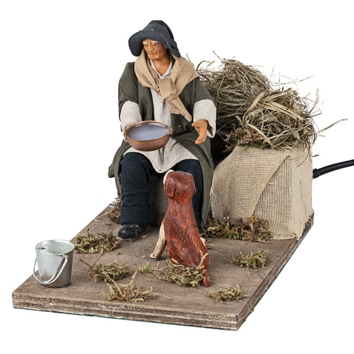 Man giving water to the dog in movement 12 cm