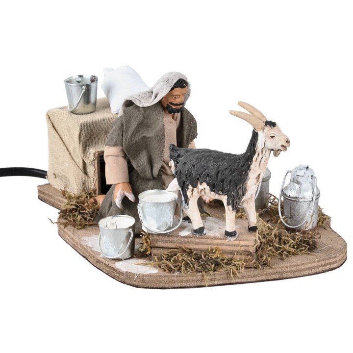 Man milking goat in motion 12 cm