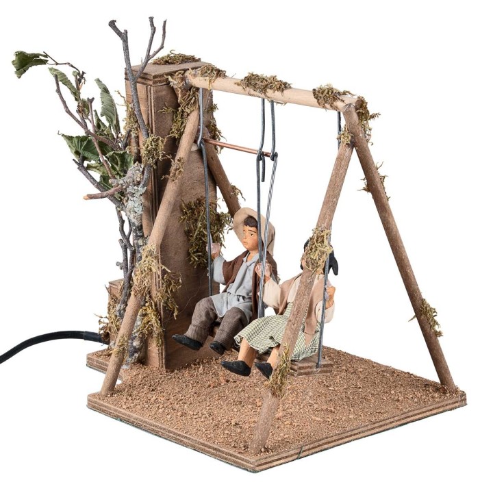 Children on a moving swing 24 cm