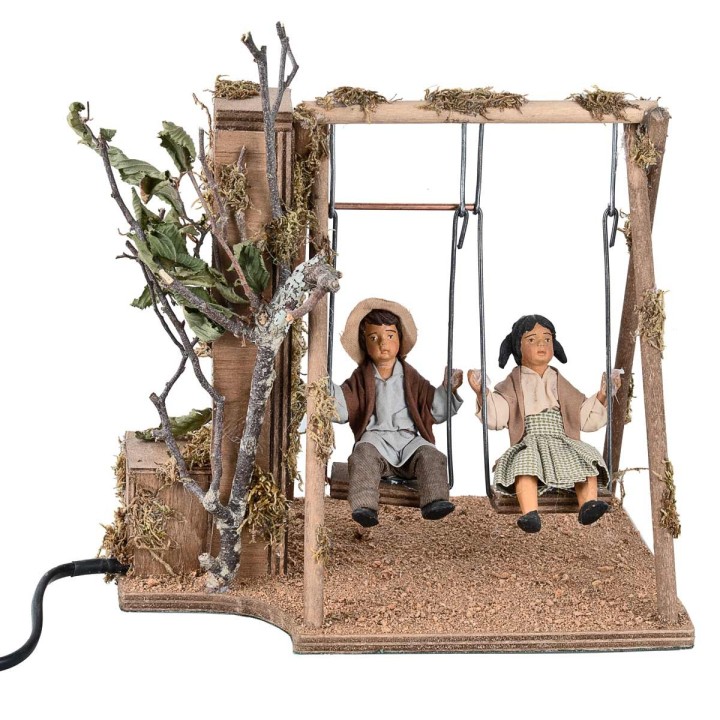 Children on a moving swing 24 cm