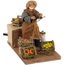 Fruttivendolo con bilancia in movimento 12 cm