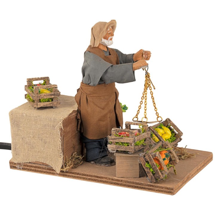 Fruttivendolo con bilancia in movimento 12 cm