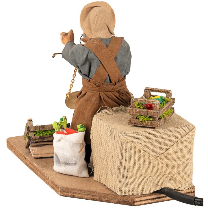 Fruttivendolo con bilancia in movimento 12 cm