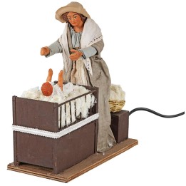 Mamá con niño en la cuna en movimiento 24 cm