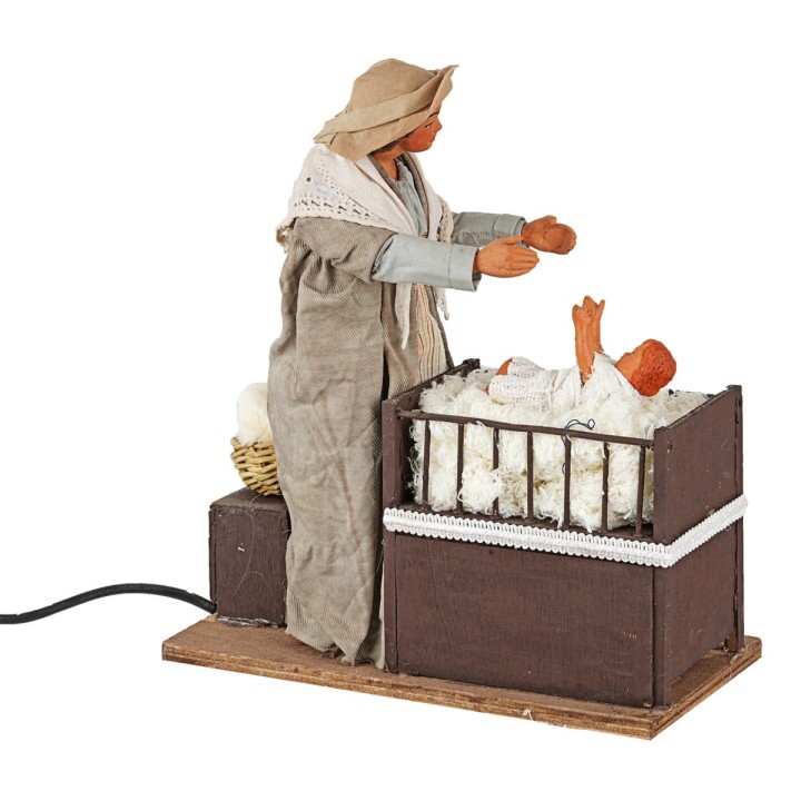 Mother with baby in moving cradle 24 cm
