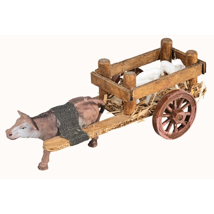 Carro de madera con ovejas