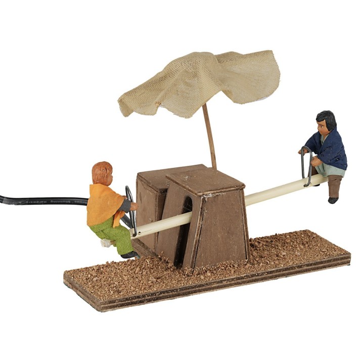 Niños en el columpio en movimiento 12 cm