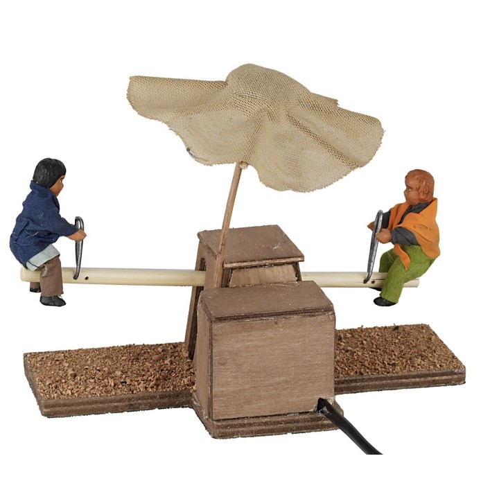 Bimbi sul dondolino in movimento 12 cm