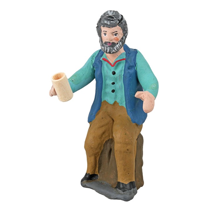 Seated man with glass in hand from the 10 cm series in painted
