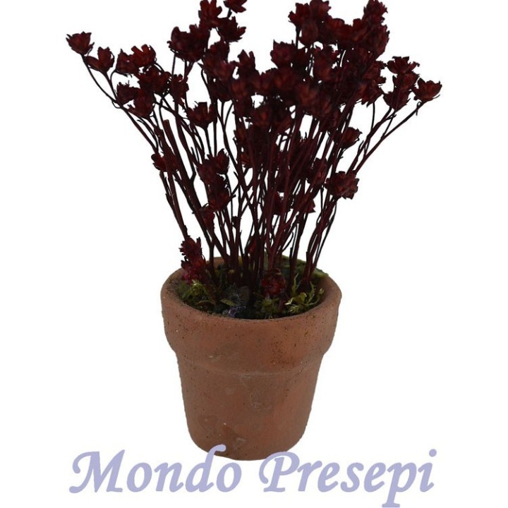 Jarrón con flores rojas