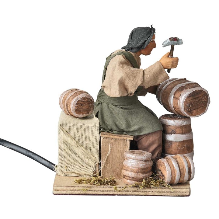 Man repairing barrels series 14 cm in motion