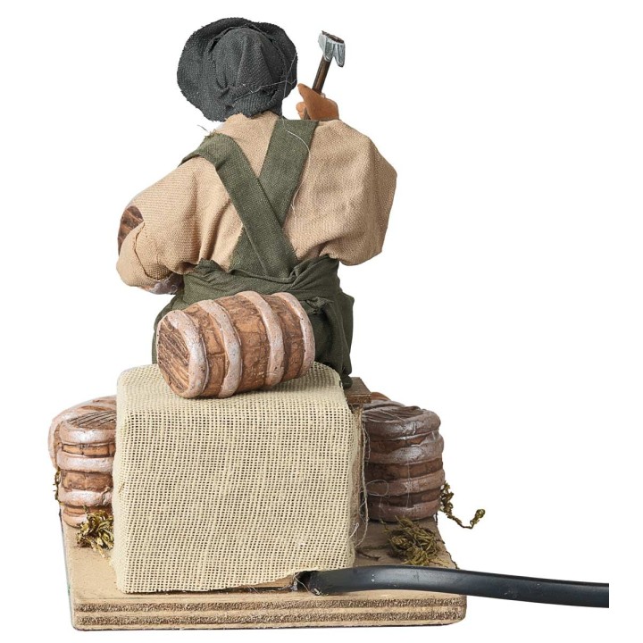 Man repairing barrels series 14 cm in motion