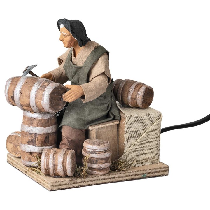 Man repairing barrels series 14 cm in motion