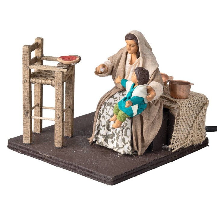 Mother feeding the child series 12 cm in motion