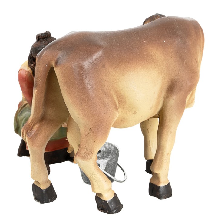 Mujer ordeñando vaca serie 11 cm en resina