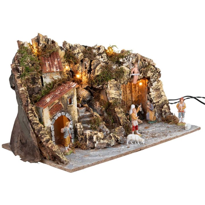 Illuminated nativity scene with waterfall and Landi figurines