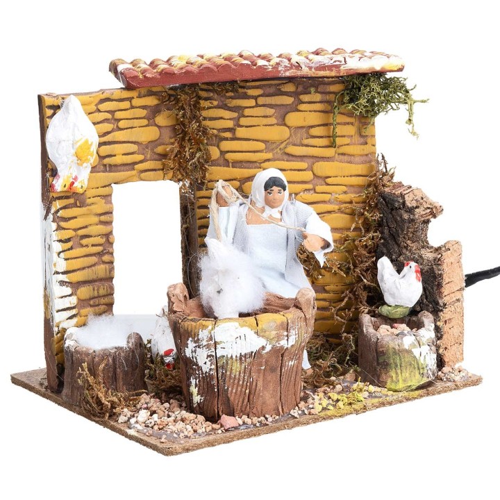 Mujer con gallinas 10 cm en movimiento cm 17x14x14,5 h
