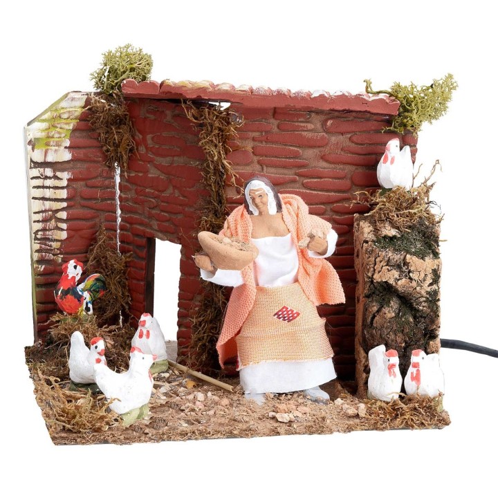 Contadina con galline 10 cm in movimento cm 17x14x14 h