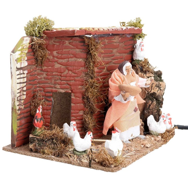Contadina con galline 10 cm in movimento cm 17x14x14 h
