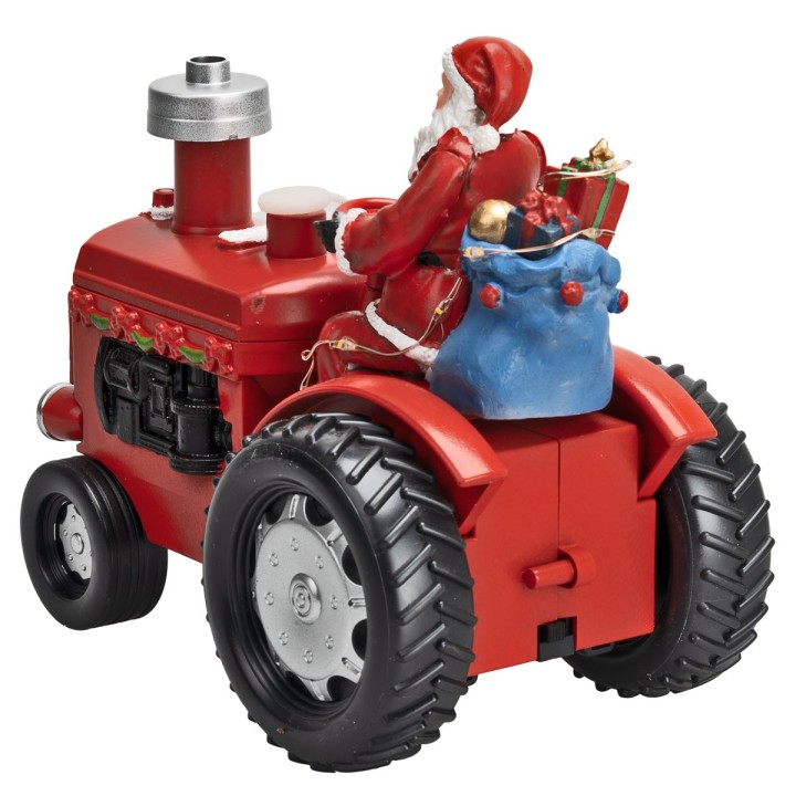 Papá Noel en el tractor con paquetes de regalos completo con
