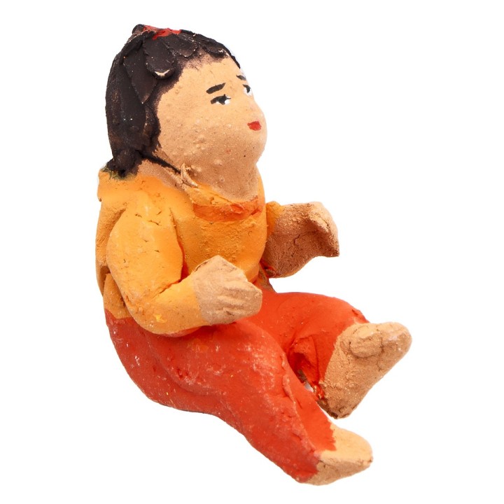 Seated terracotta girl with orange coloring 3.6 cm
