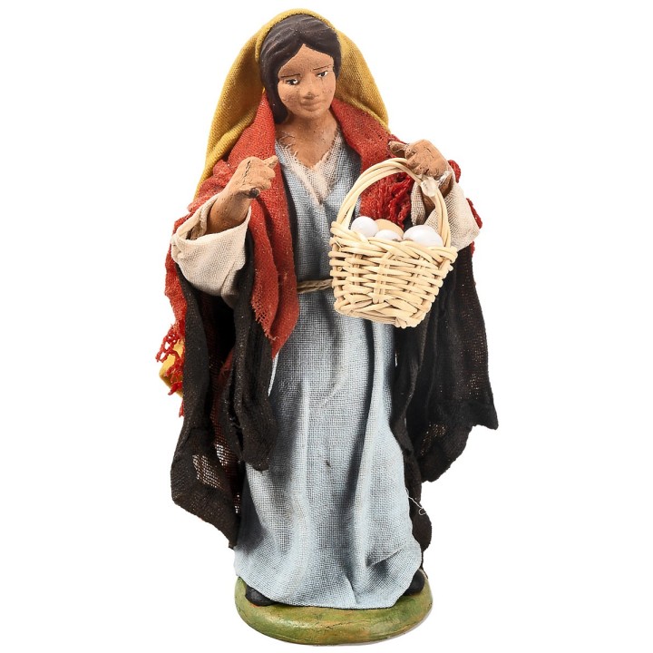 Campesina con cesta de huevos 12 cm en terracota con ropa de