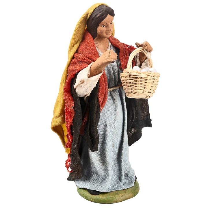 Peasant woman with a basket of eggs 12 cm in terracotta with