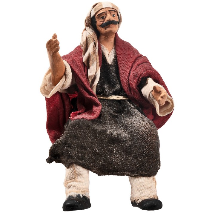 Campesino sentado serie 15 cm en terracota con ropa de tela