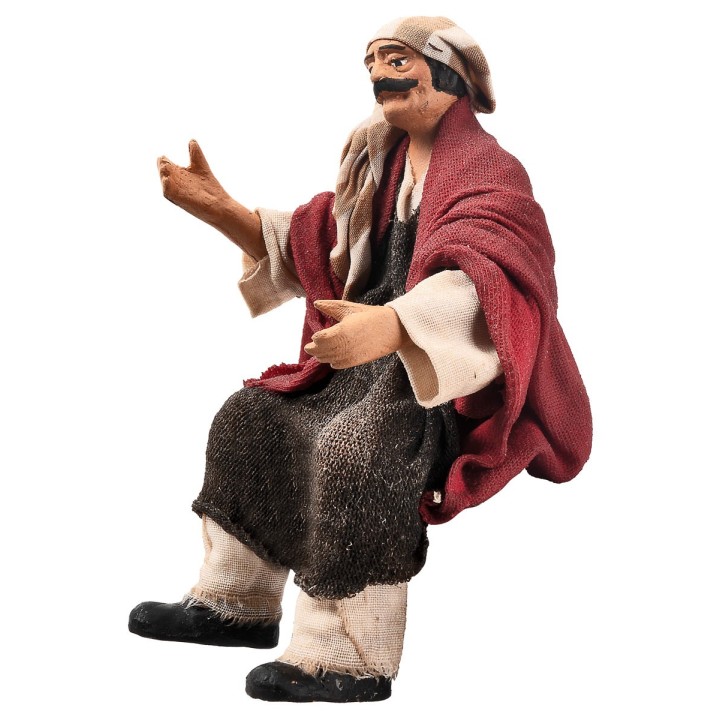 Seated farmer 15 cm series in terracotta with fabric clothes
