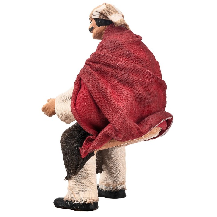 Seated farmer 15 cm series in terracotta with fabric clothes
