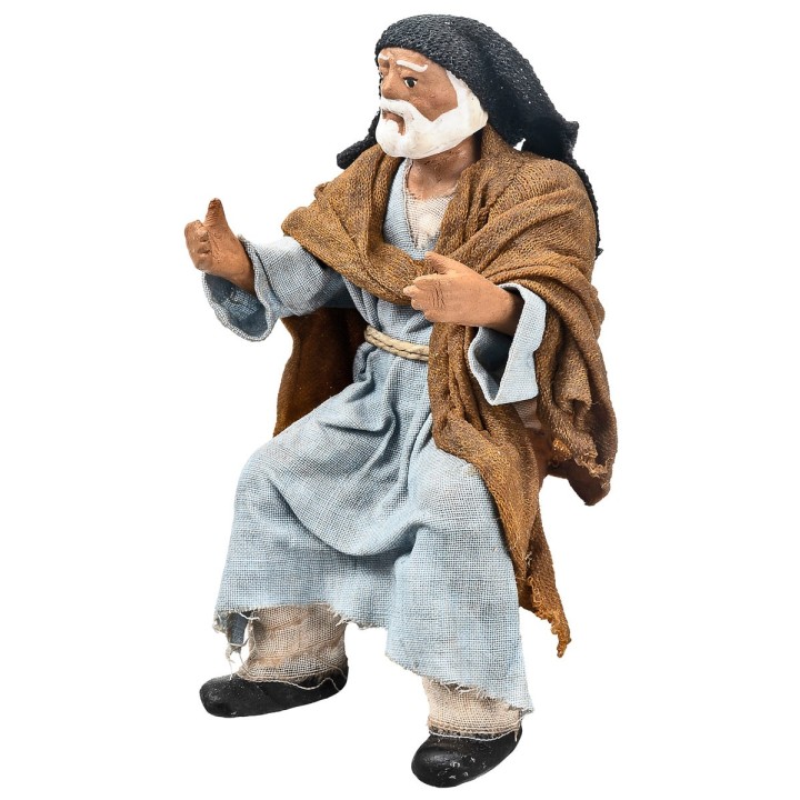 Seated Palestinian man 15 cm series in terracotta with fabric