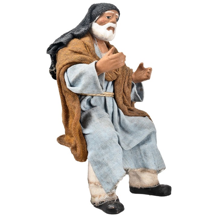 Hombre palestino sentado serie 15 cm en terracota con ropa de