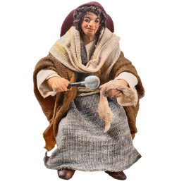 Donna seduta con stoffa serie 10 cm in terracotta con abiti in