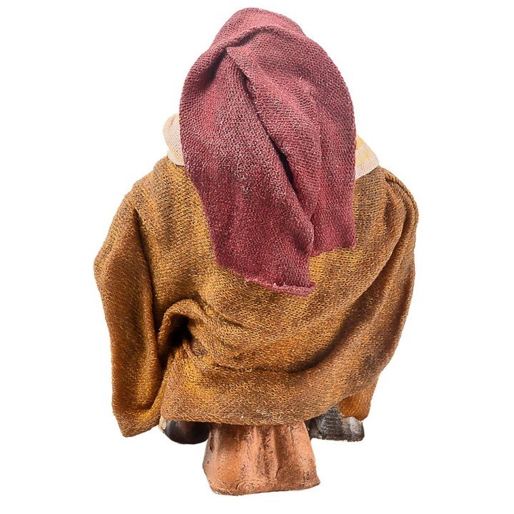 Seated woman with fabric 10 cm series in terracotta with fabric