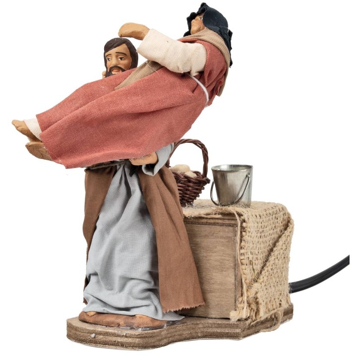 Man with pregnant woman in arms h 12.5 cm in motion