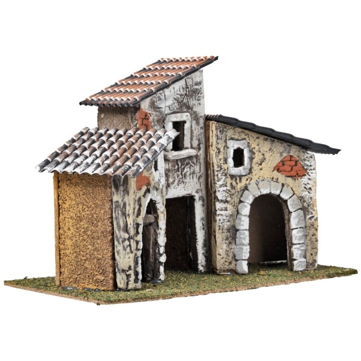 Tres casas con arcos de piedra y fachadas envejecidas cm
