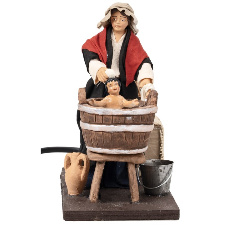 Woman washing child in motion 14 cm