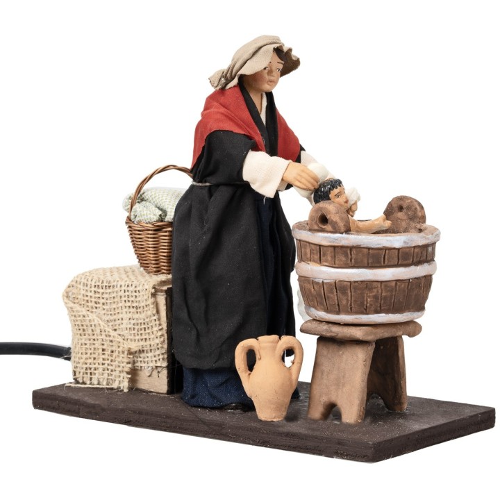 Woman washing child in motion 14 cm