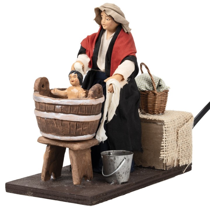 Woman washing child in motion 14 cm
