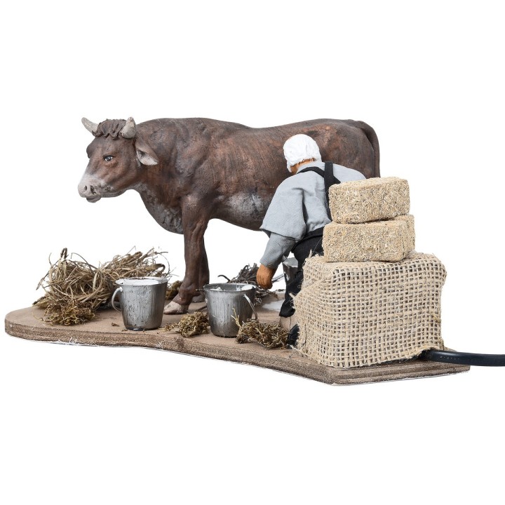 Farmer milking in motion series 14 cm
