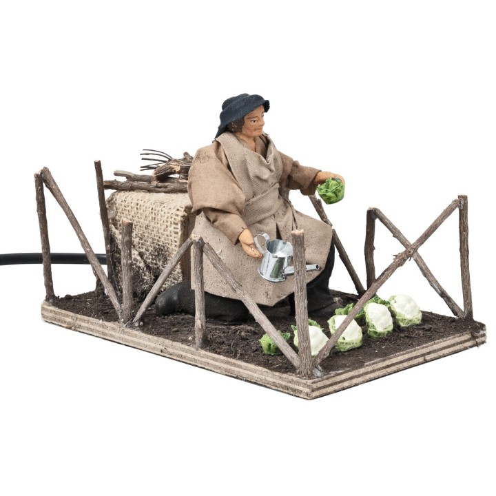 Peasant woman cultivating vegetables in motion series 10 cm