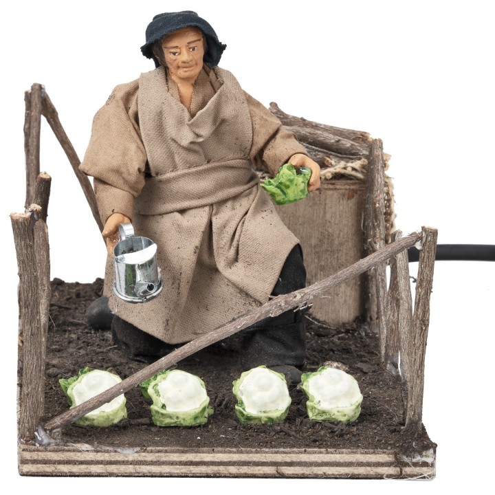 Campesina que cultiva hortalizas en movimiento serie 10 cm