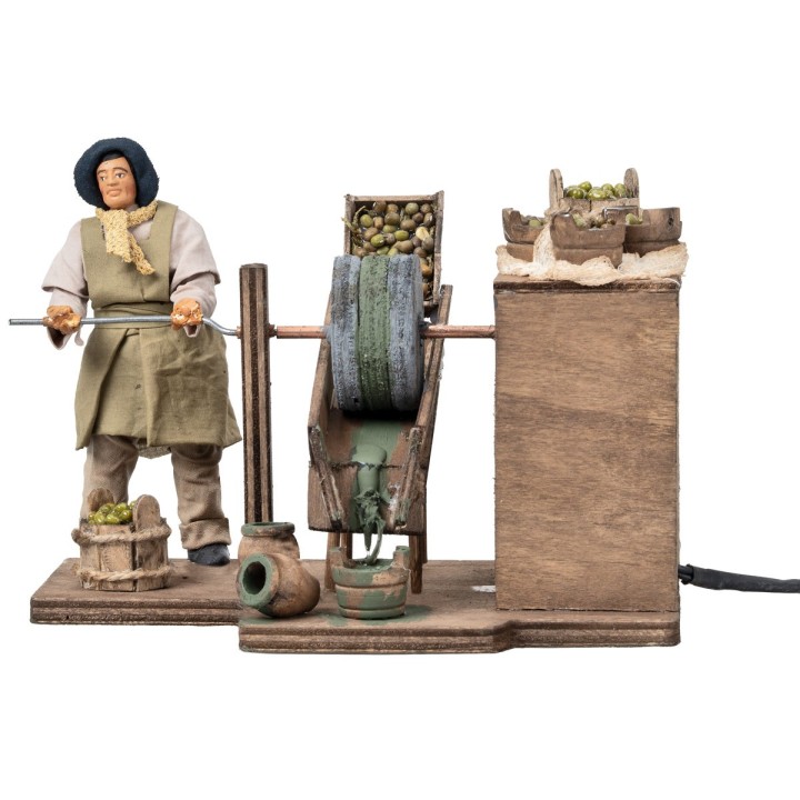 Man grinding olives in motion series 12 cm