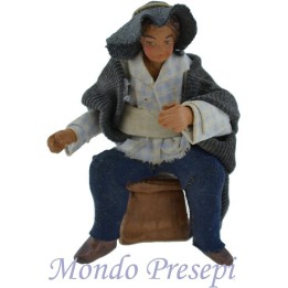 Cm 12 Uomo seduto su sgabello