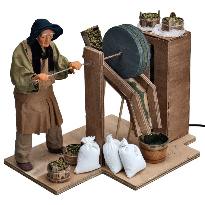 Uomo con macina per olive serie 25 cm in movimento