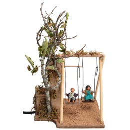 Dos niños en el columpio serie 10 cm con doble movimiento