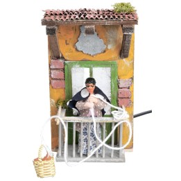 Donna al balcone con paniere 10 cm in movimento